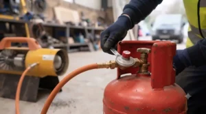 Safe connection process for attaching a propane cylinder to a forced air space heater unit.
