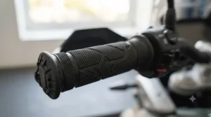 Close-up view of durable, weather-resistant rubber texture on premium heated motorcycle grips for improved wet-weather grip.