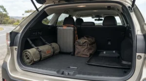 Neatly rolled heated travel blanket for car boot storage